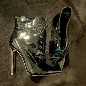 Brand New black patent leather booties, 5 inch Stiletto heels, faux fur lining